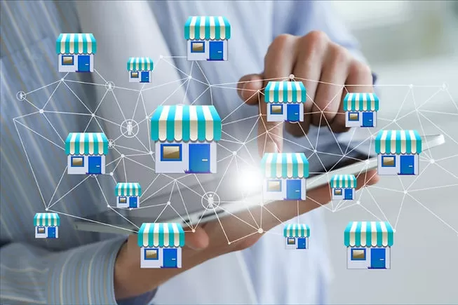 Software para franquias odontológicas. Gestor de franquias administrando suas redes através de um tablet.