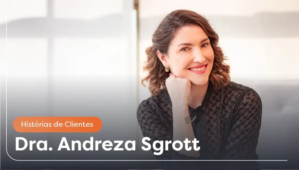 Dra. Andreza Sgrott sorrindo.